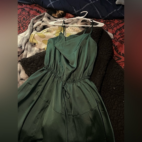 Flowing green dress length is short and long - Picture 1 of 2